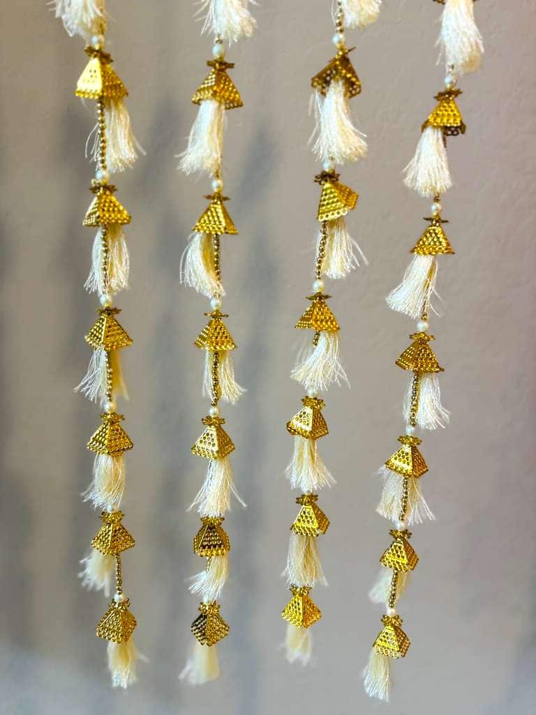 Golden jhumka with silk tassel garland — textile · set of 2 · 4 ft tall, everything in the package, laid out