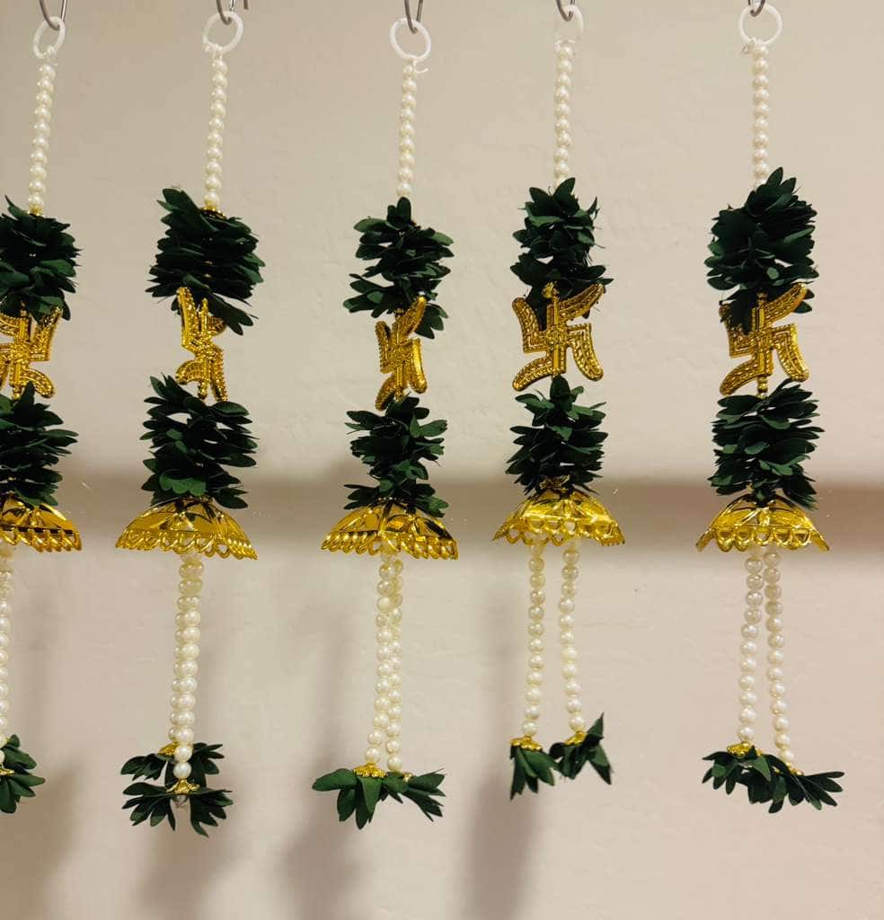 Pearl beaded green flower Swastik garland — set of 5 · 1 ft tall, beside something familiar, for scale