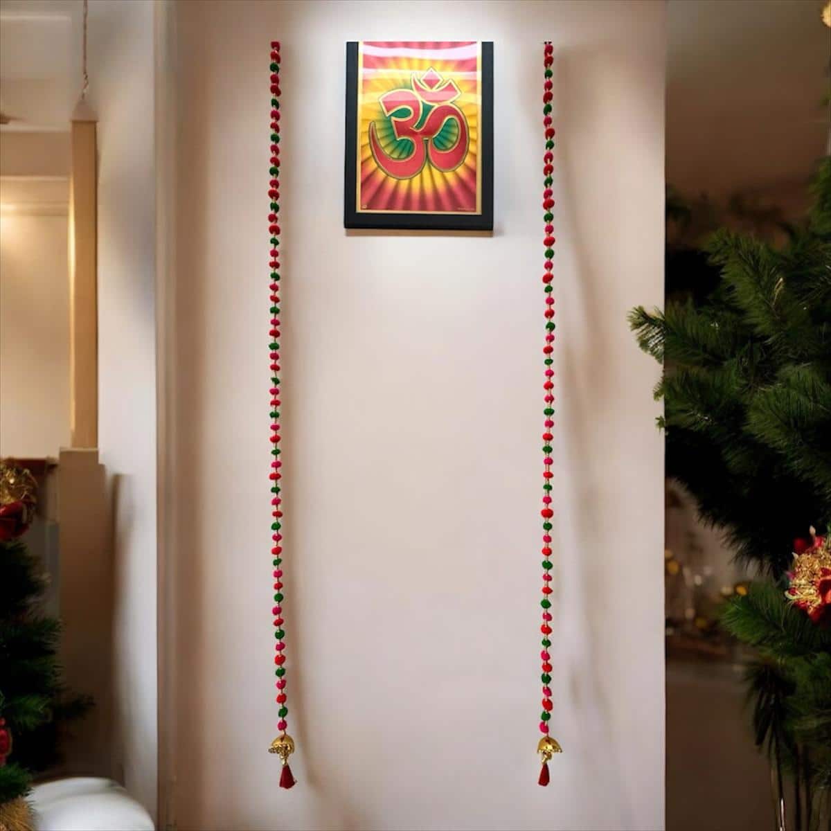 Red and green pom-pom garland — set of 2 · 5 ft tall, beside something familiar, for scale