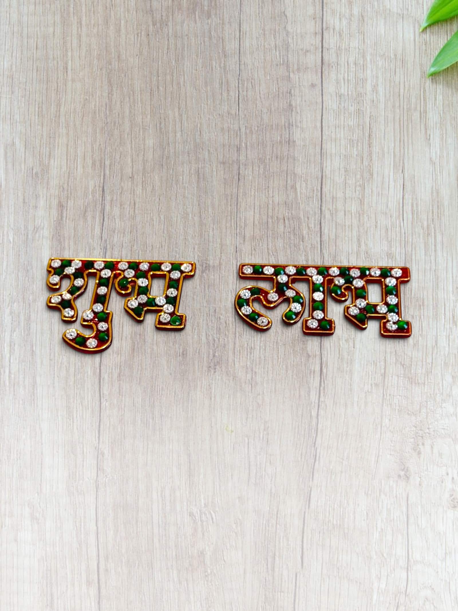 Stone-set Shubh Labh letters, pair, the Red and green option