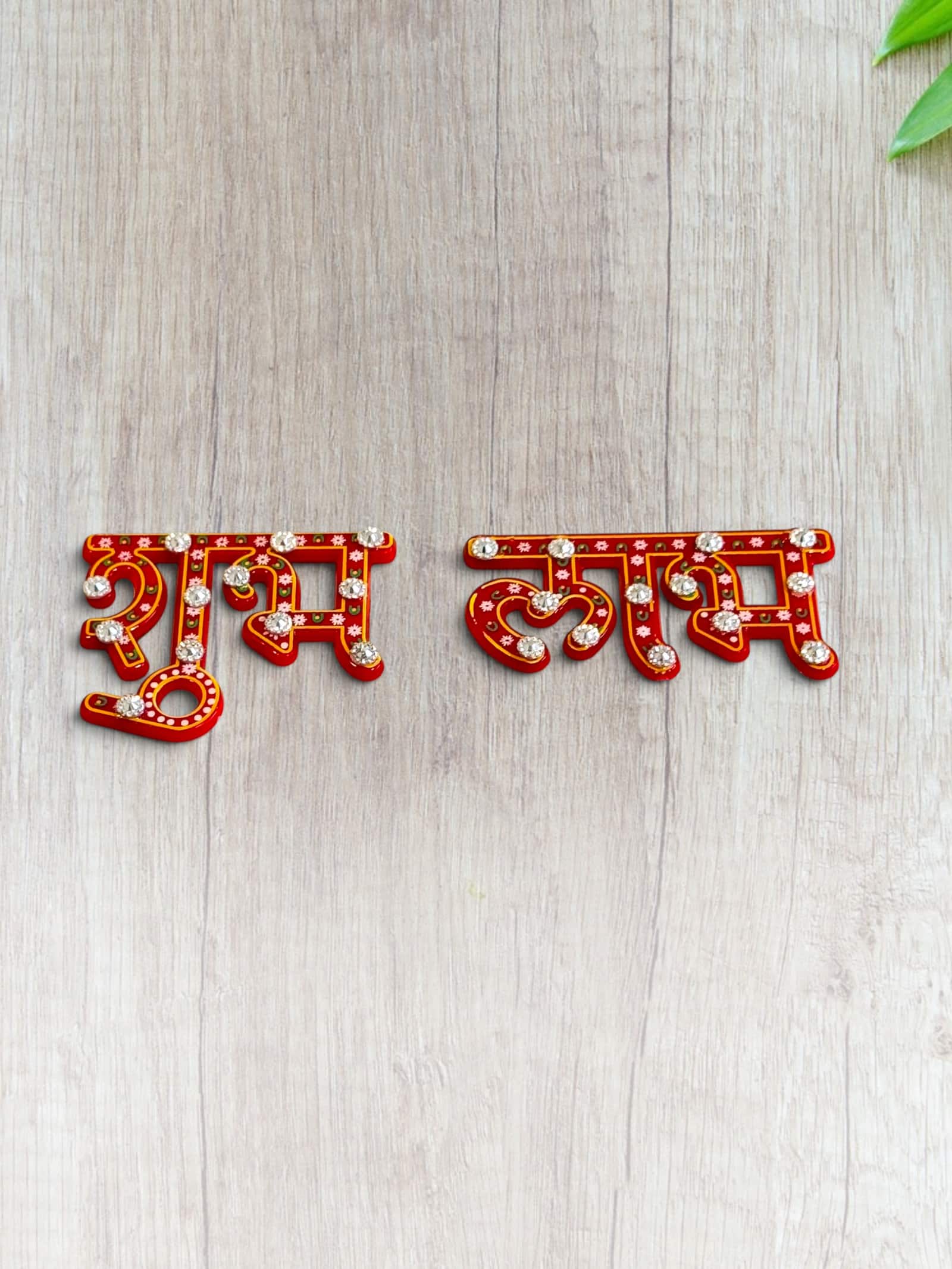 Stone-set Shubh Labh letters, pair, the Red painted option