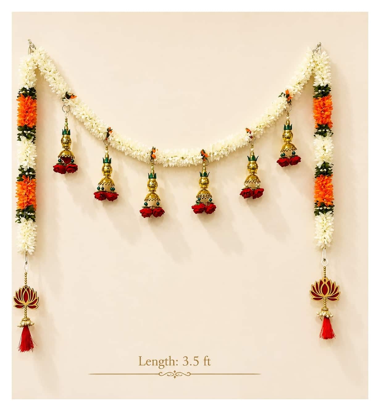 Jasmine and marigold toran with kalash drops — 3.5 ft long, beside something familiar, for scale